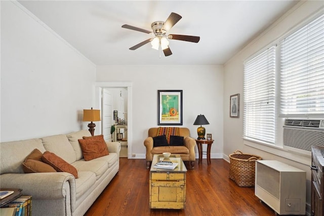 living area with ceiling fan, cooling unit, dark wood finished floors, and baseboards