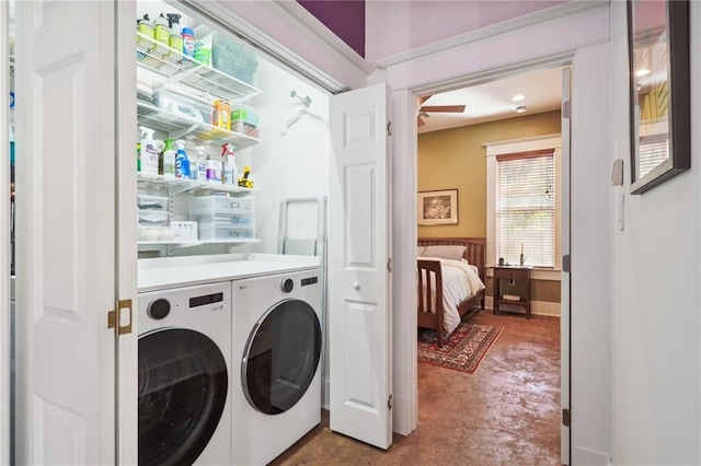 washroom with ceiling fan, carpet floors, and washer and dryer