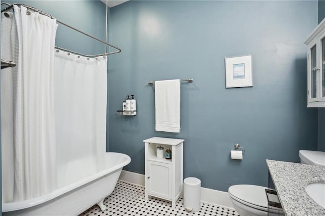 full bathroom with toilet, vanity, tile patterned floors, and independent shower and bath