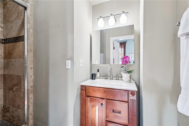 bathroom featuring vanity and walk in shower