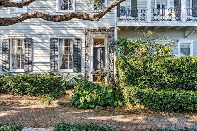 doorway to property with a balcony