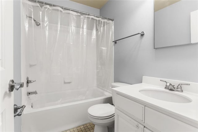 full bathroom with tile patterned flooring, vanity, shower / tub combo, and toilet