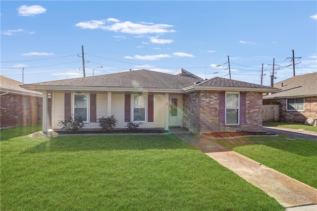 single story home featuring a front yard and covered porch