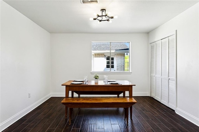 dining room with dark wood-type flooring