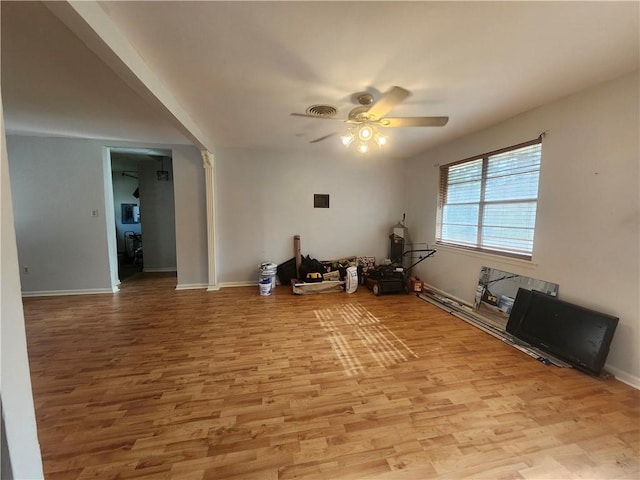 spare room with ceiling fan and light hardwood / wood-style floors