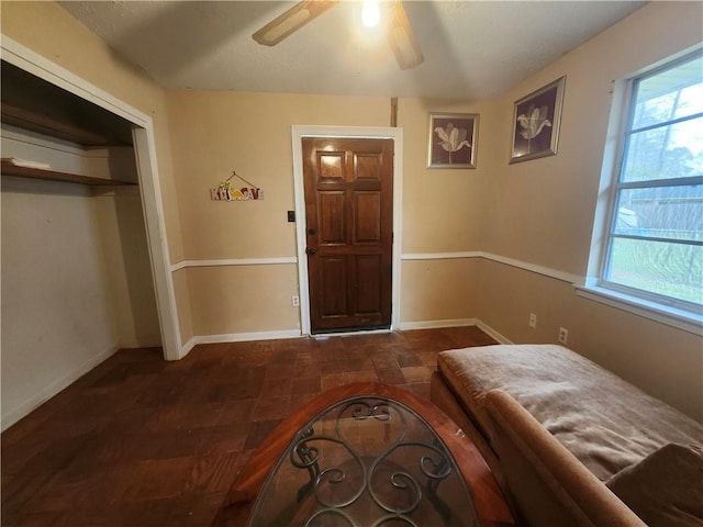 bedroom featuring a closet and ceiling fan