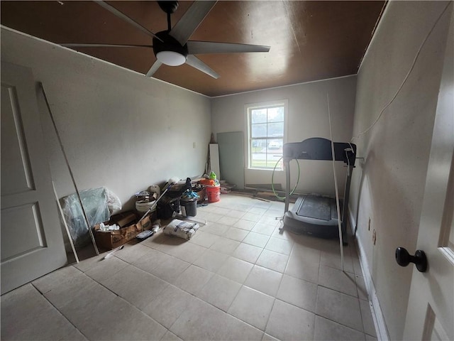 misc room with ceiling fan and light tile patterned floors