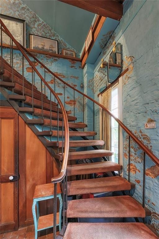 stairway with a high ceiling