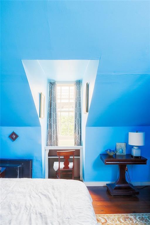 bedroom featuring wood-type flooring