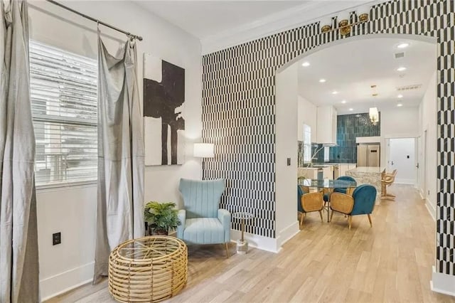 living area with light hardwood / wood-style flooring