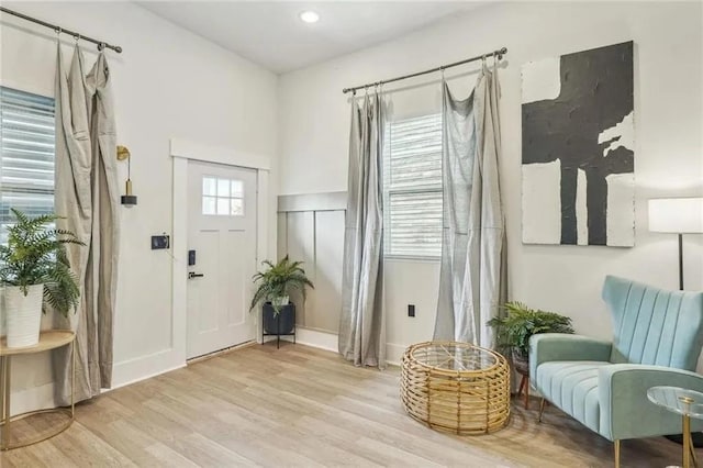 entryway with light hardwood / wood-style floors