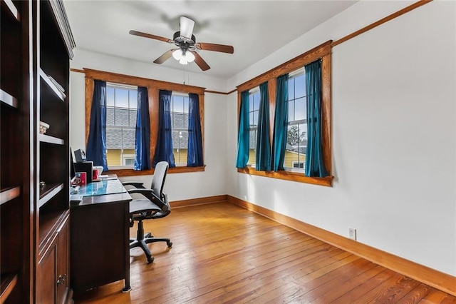 office area with ceiling fan and light wood-type flooring