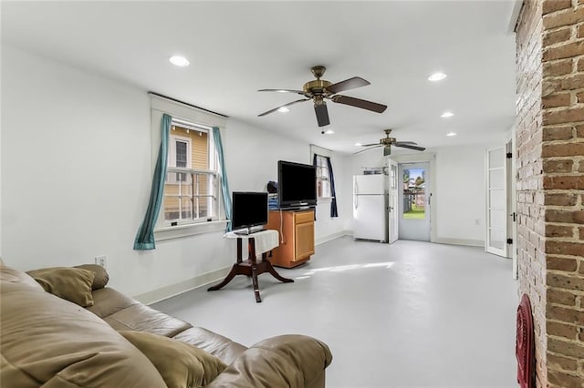 living room featuring ceiling fan