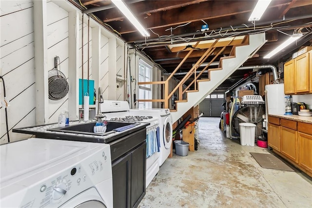 basement featuring separate washer and dryer