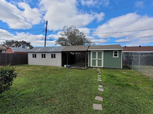 view of outdoor structure featuring a lawn