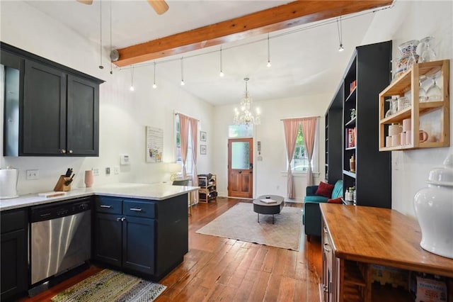 kitchen with hardwood / wood-style flooring, beam ceiling, decorative light fixtures, stainless steel dishwasher, and kitchen peninsula