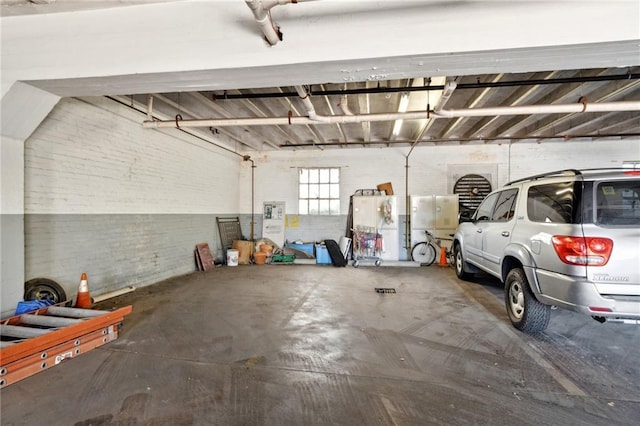 garage featuring a carport