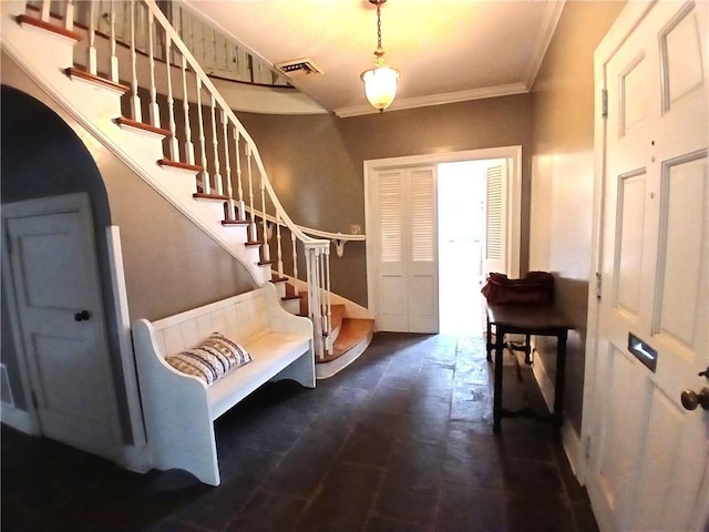 entrance foyer with ornamental molding