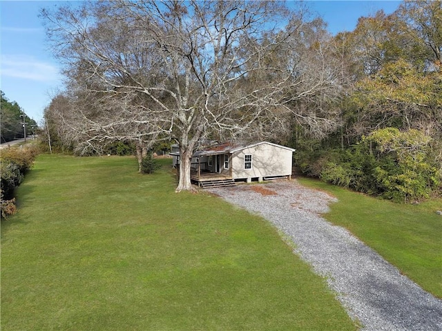 view of yard featuring a wooden deck