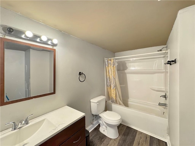 full bathroom with hardwood / wood-style floors, shower / bath combo, toilet, and vanity