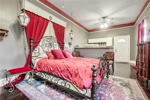 bedroom with hardwood / wood-style flooring and ceiling fan