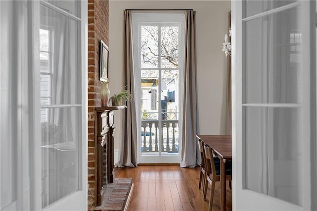 entryway with hardwood / wood-style floors