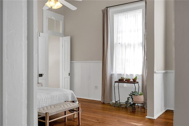 bedroom featuring hardwood / wood-style flooring and ceiling fan