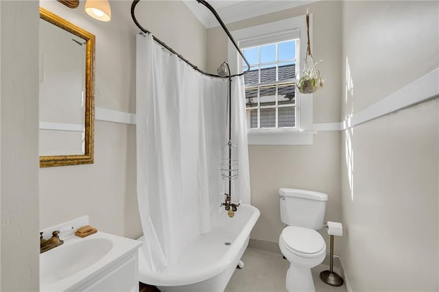 bathroom with a bathing tub, toilet, and sink