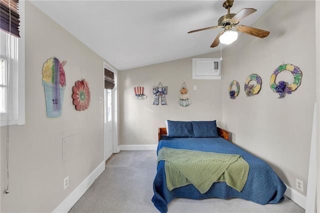 carpeted bedroom featuring an AC wall unit, ceiling fan, and lofted ceiling