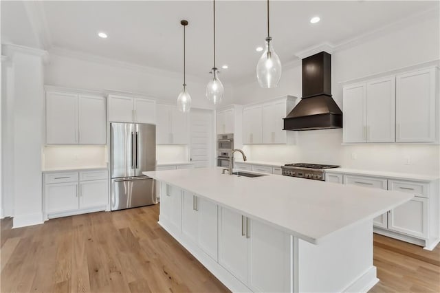 kitchen with white cabinetry, custom range hood, stainless steel appliances, and hanging light fixtures