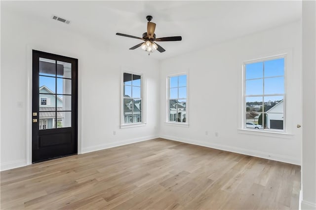 entrance foyer with light hardwood / wood-style floors and ceiling fan