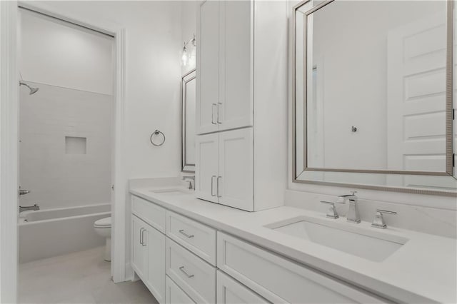 full bathroom featuring shower / bathing tub combination, vanity, and toilet