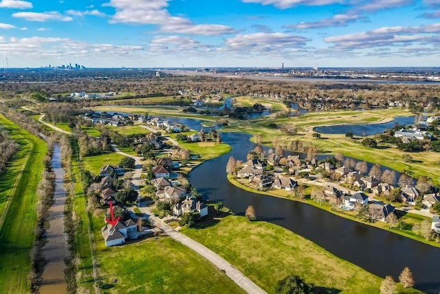 birds eye view of property with a residential view and a water view