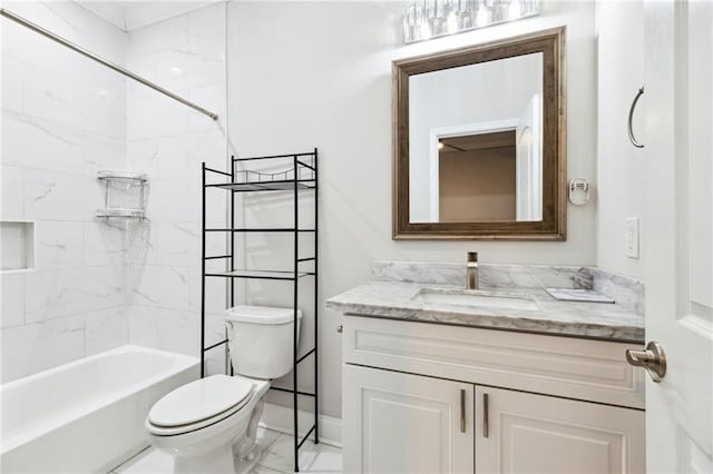 full bathroom featuring toilet, vanity, and tiled shower / bath