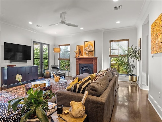 living room with crown molding, ceiling fan, plenty of natural light, and french doors