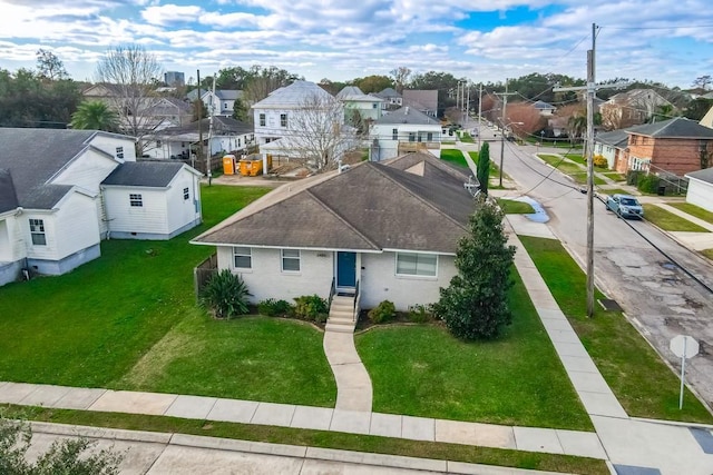 view of front of home with a front yard