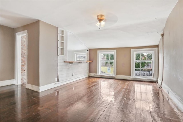 833 Burgundy St # 1 3 5, New Orleans, LA 70116 - unfurnished living room featuring hardwood / wood-style floors and vaulted ceiling