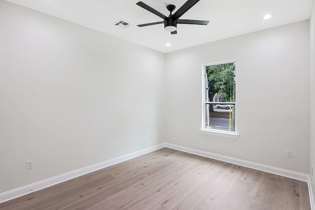 unfurnished room featuring ceiling fan and light wood-type flooring