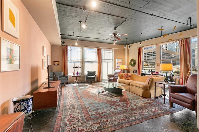 living room with ceiling fan