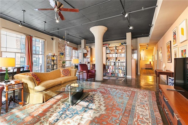 living room featuring ceiling fan and rail lighting