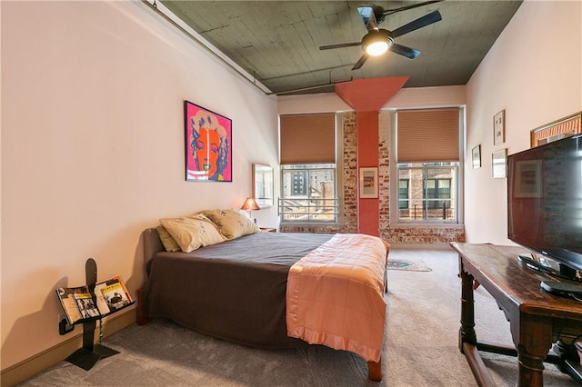 bedroom with ceiling fan and carpet floors