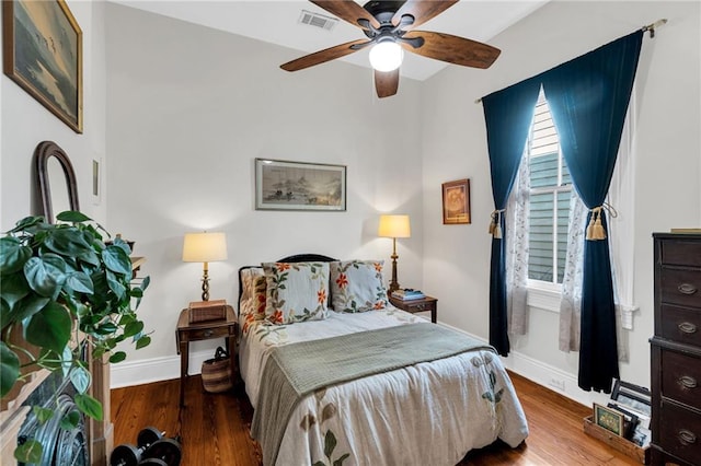 bedroom featuring ceiling fan and hardwood / wood-style flooring