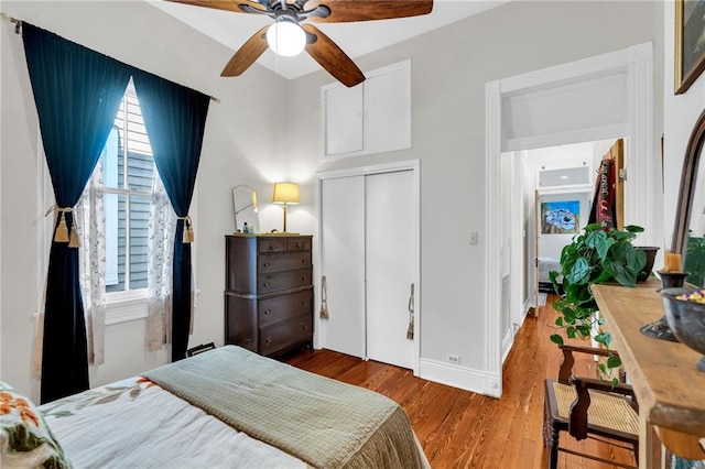 bedroom featuring a closet, ceiling fan, and hardwood / wood-style floors