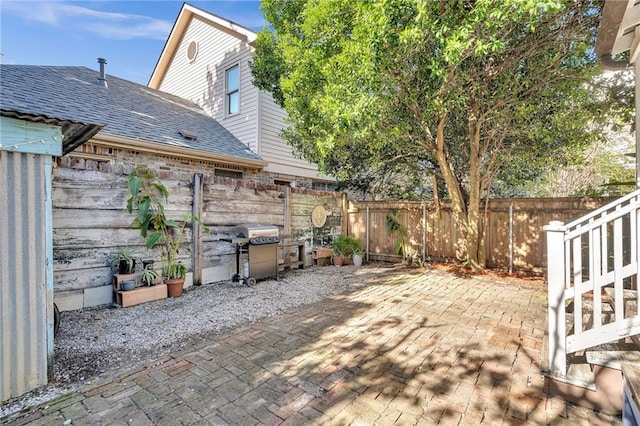 view of patio / terrace featuring a grill