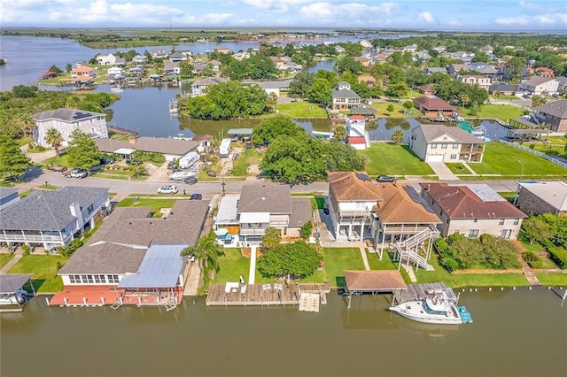 aerial view featuring a residential view and a water view