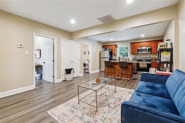 living room with wood-type flooring