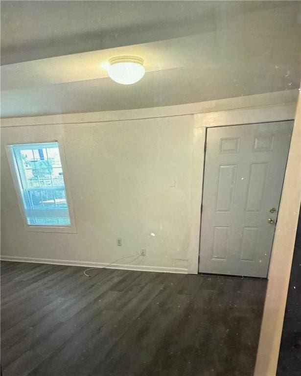 interior space with dark wood-type flooring