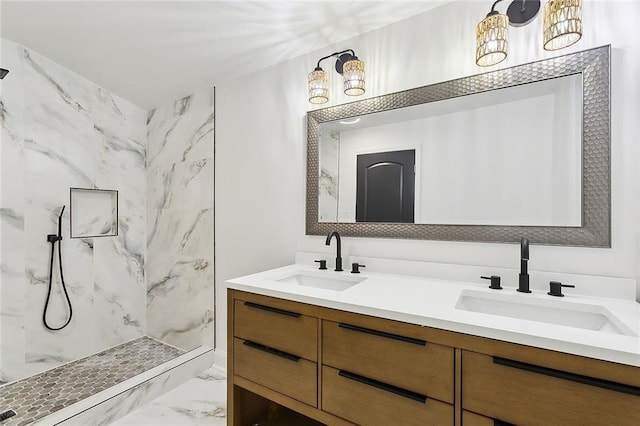 bathroom featuring vanity and tiled shower