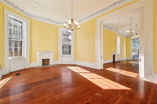 1432 Magazine St, New Orleans, LA 70130 - interior space with hardwood / wood-style flooring, an inviting chandelier, basketball court, and ornamental molding