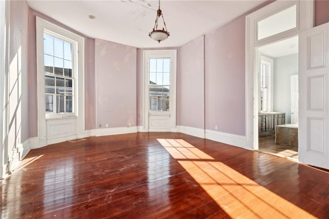 1432 Magazine St, New Orleans, LA 70130 - empty room featuring hardwood / wood-style floors